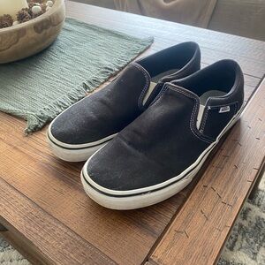 Vans Black and White Slip-On Sneakers